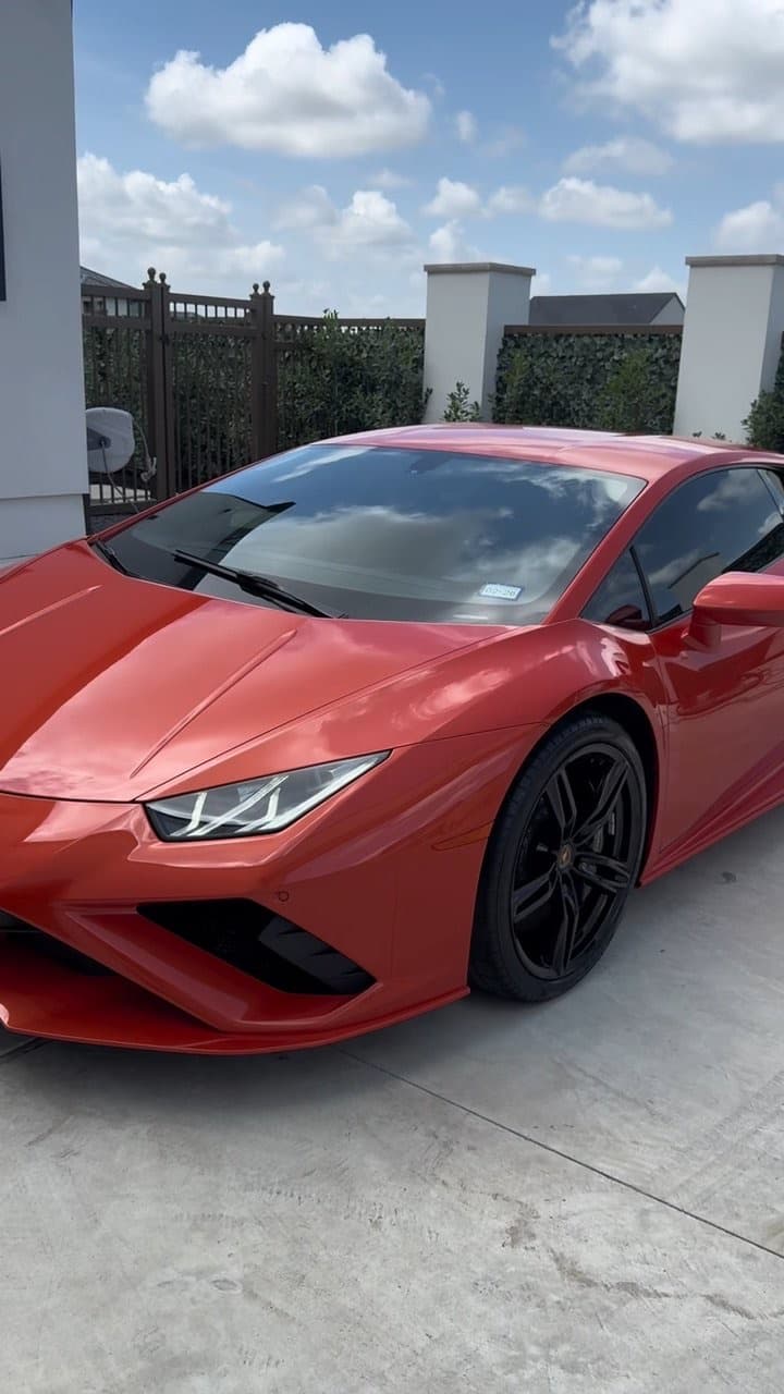 Three-quarter view of a red Huracán after detailing